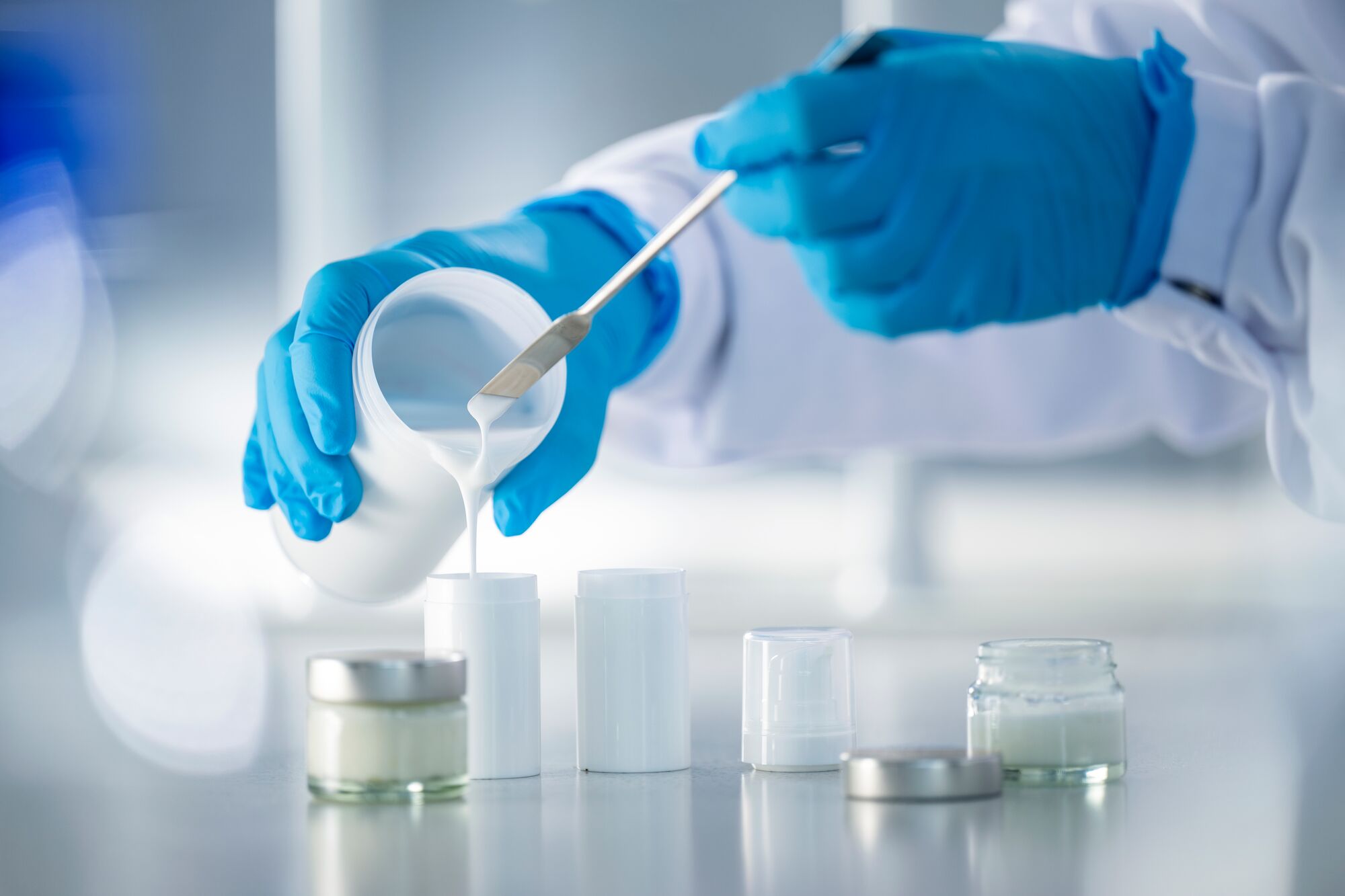 Laboratory, hands with rubber gloves, spatula, 